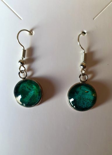 Silver colour round drop earrings containing containing dark green and gold gilded original art work