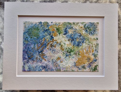 Gilded garden Texture abstract of greens and blues depicting flowers gilded with gold made using flowers and acrylics.