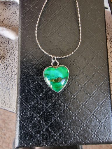 Sterling silver heart pendant on sterling silver flat chain, pendant contains green and gold art